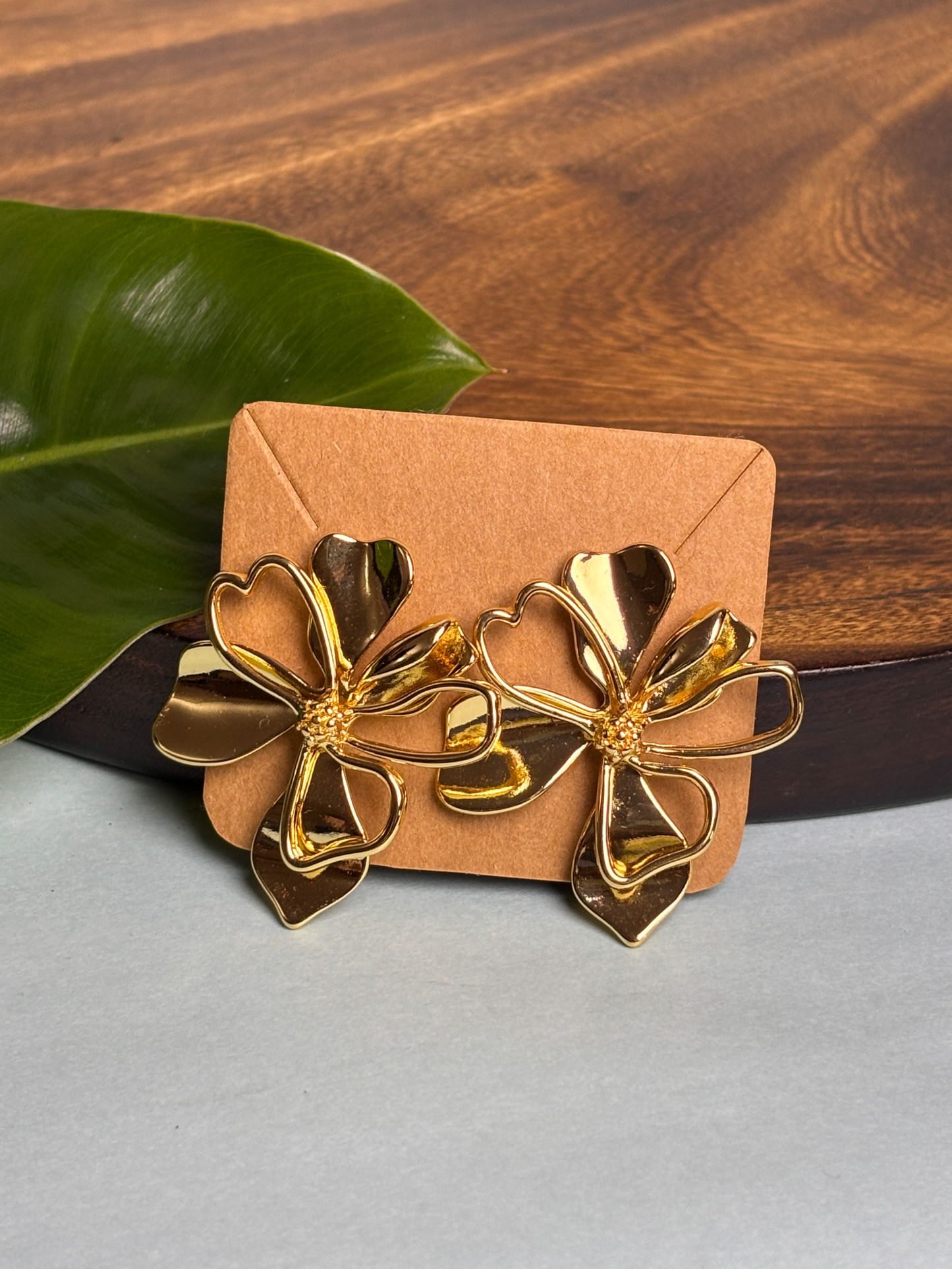 Statement gold floral earrings