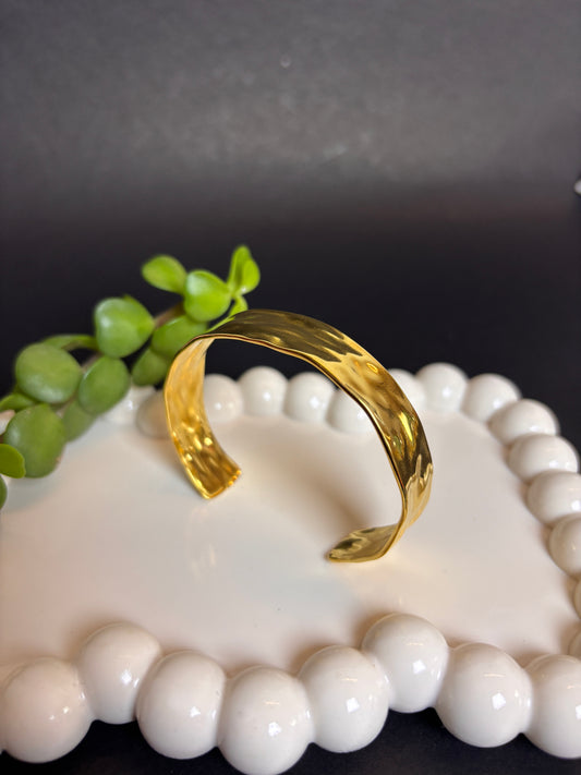 Sleek gold bracelet